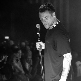 Jason Williamson on stage at London’s Hammersmith Apollo in 2019.