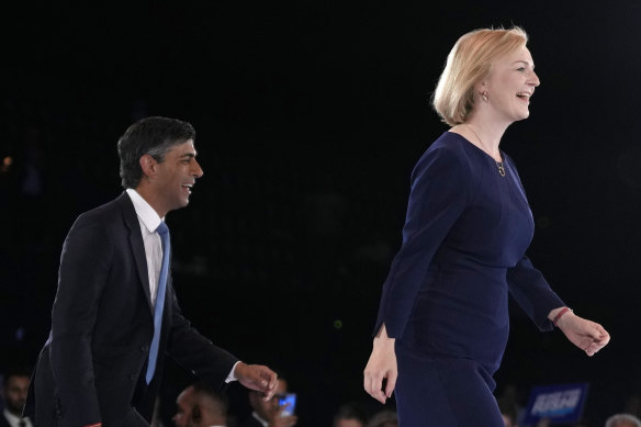 Trailing in the pools, Rishi Sunak follows Liz Truss off the stage after a Conservative leadership election hustings at Wembley Arena in London on August 31.