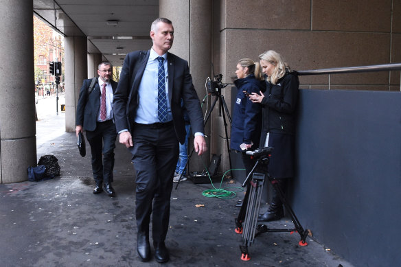 AFP officers arrive at the ABC on June 5.
