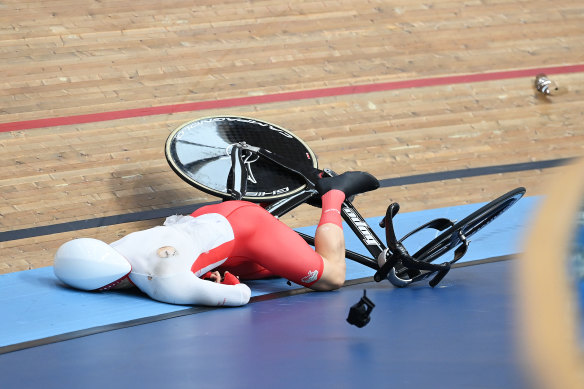 Joe Truman falls from his bike.