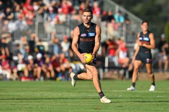 Back on track: Coniglio in the practice match against the Swans.