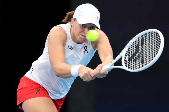 Iga Swiatek taking on Caroline Garcia in Sydney.