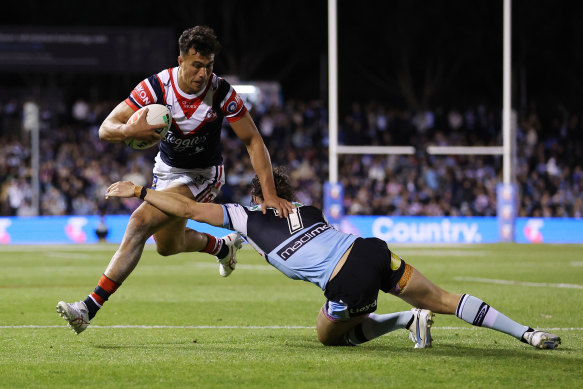 Joseph Suaalii was playing strongly for the Roosters but later left the game with a concussion.