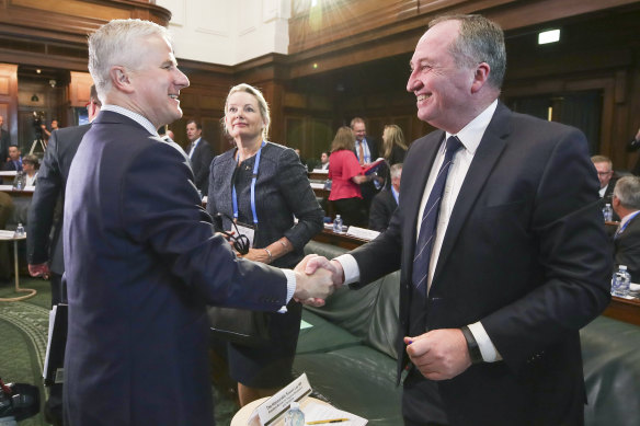 Michael McCormack greets Barnaby Joyce during the National Drought Summit held at Old Parliament House in 2018. 