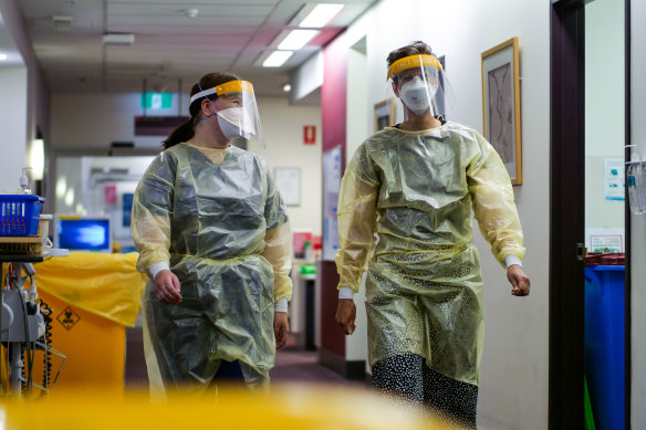 Nurse Kate Fitzpatrick (left) and Denise Jenkins, associate unit manager and midwife at the Royal Women’s Hospital COVID maternity ward. 