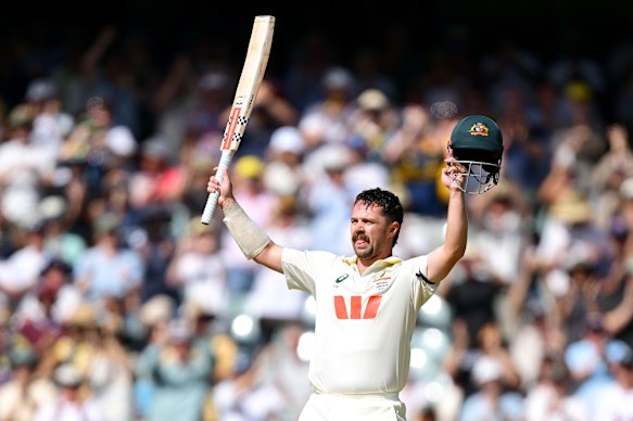 Travis Head celebrates his fourth consecutive century in an Adelaide Test.