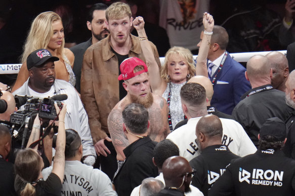 Jake Paul’s mother, Pam Stepnick, celebrates his win.