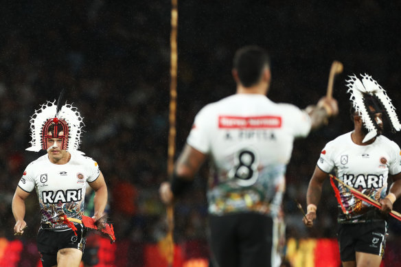 The Indigenous All Stars perform their war dance at CommBank Stadium.