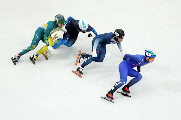 Australian Brendan Corey fights it out for third position.