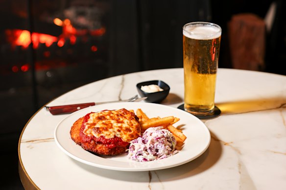 A fireside chicken parma with coleslaw and fries at The Kingston Hotel in Richmond.