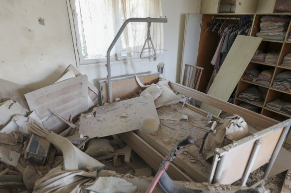 A house is heavily damaged after it was hit by a missile fired from the Gaza Strip.