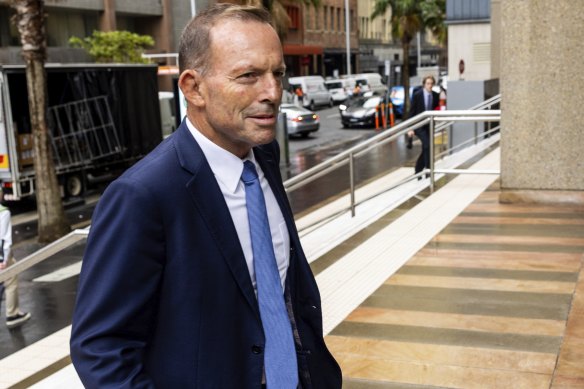 Former prime minister Tony Abbott arrives at the Law Courts Building in Sydney to attend the swearing in of Ian Jackman to the Federal Court.
