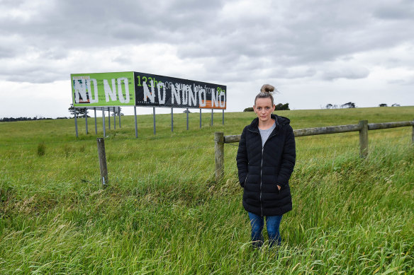 Kat Mann in front of a large piece of Cranbourne West farmland at the centre of an IBAC corruption probe.