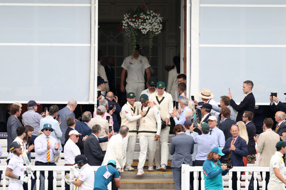 David Warner and Usman Khawaja lead the Australians onto the field after lunch on day five of the Lord’s Test.