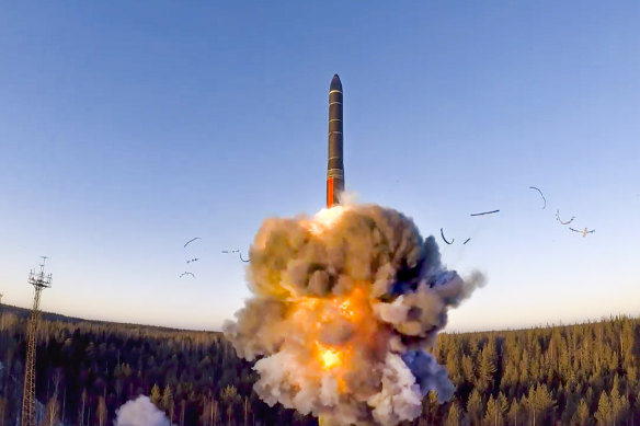 A rocket launches from missile system as part of a ground-based intercontinental ballistic missile test launched from the Plesetsk facility in north-western Russia. 