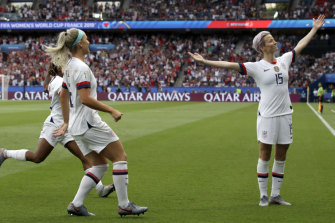Megan Rapinoe, right, celebrates after scoring the US' first goal against France in the World Cup quarter finals.