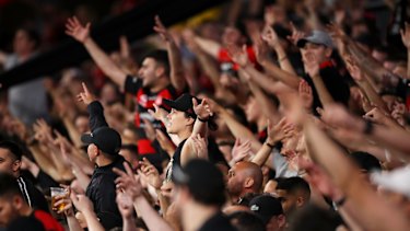 Wanderers supporters in full cry for the first derby at their new home.