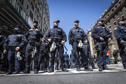 NYPD officers from the Strategic Response Group form a wall of protection against the pro-Palestinian protest encampment at Columbia University.