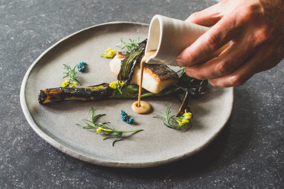 Pan-fried Murray cod, charred leek and shellfish cream.