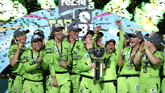 Rachael Haynes lifts the WBBL trophy.