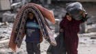 Palestinians displaced by the Israeli air and ground offensive on the Gaza Strip flee from Hamad City, following an evacuation order by the Israeli army to leave parts of the southern area of Khan Younis.