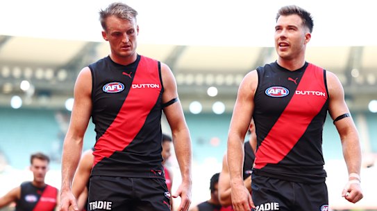 Mason Redman and Zach Merrett stood strong for the Bombers on a day the red and black faithful would rather forget.