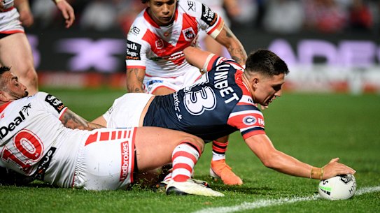 Lock Victor Radley scores one of the Roosters' six tries.