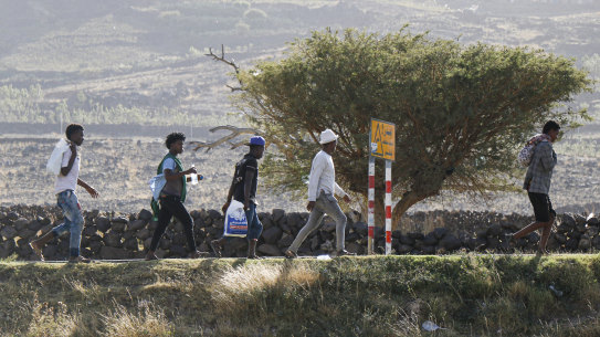 Ethiopian migrants on the outskirts of the Yemeni capital of Sana heading for the Saudi Arabian border, where some have faced violence at the hands of Saudi border guards.