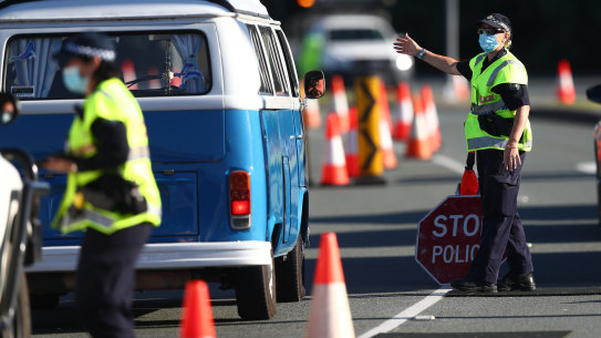Queensland Police stop vehicles on the Queensland border August 20, 2021 in Coolangatta, Australia. 