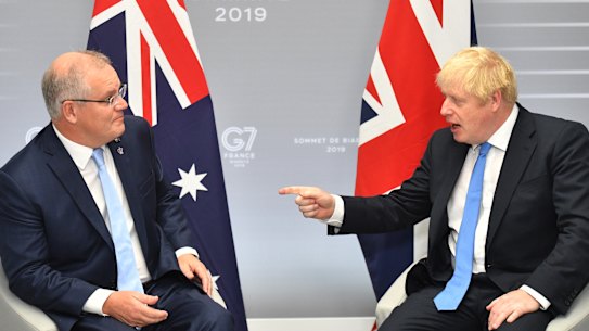 Scott Morrison and Boris Johnson talk trade in France, August 2019.