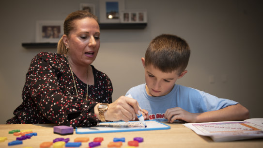 Sam Rogers, age 9, from St Charles Catholic Primary School in Waverley, is tutored in his Math by Fay Ligonis from Super Kids Tutoring.
