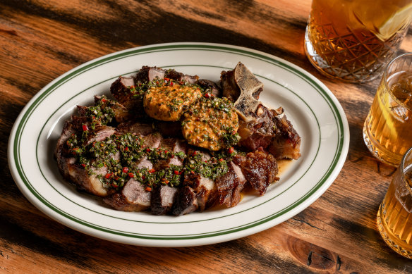 A one-kilo T-bone, topped with herby chimichurri and “cowboy butter” at Moon Dog in Footscray.