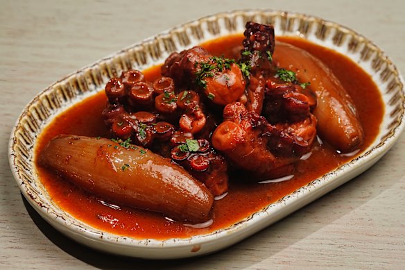 Stifado stew with octopus, shallots, vinegar, cinnamon and star anise in a tomato-tinged gravy. 