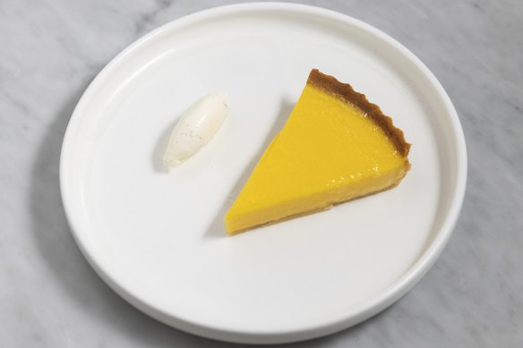 The lemon tart is so gently set, it hovers between liquid and solid.