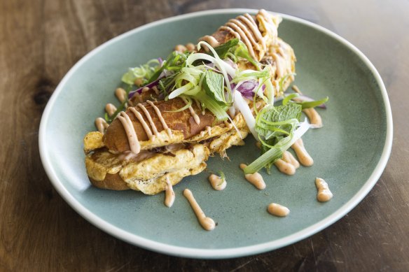 Roti John tiger roll filled with lamb shoulder and omelette.