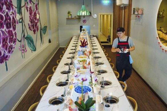 Divine Hotpot seats 30 people around a tight U-shaped track.