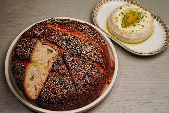 House-baked sesame sourdough with tarama and eggplant dip.
