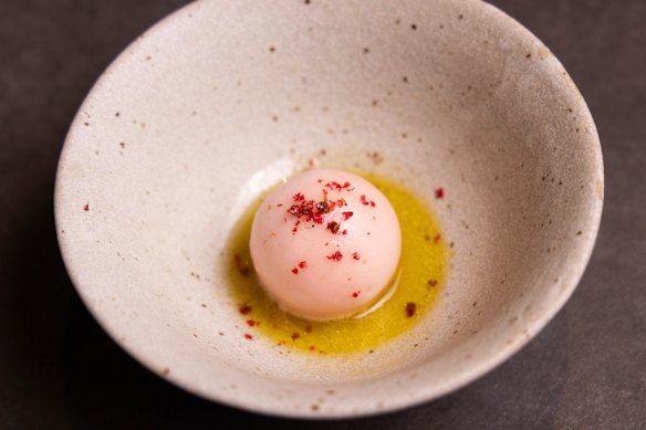 Grapefruit sorbetto sprinkled with pink peppercorns,