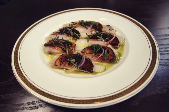 Kingfish crudo dish.