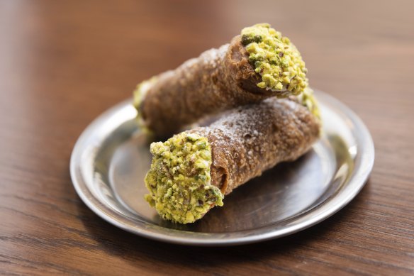 Ricotta-filled cannoli come with the correct ratio of pistachio nuts.