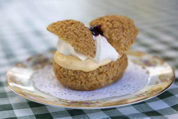 Butterfly profiterole with pillowy cream, creme brulee custard and Davidson plum jam.