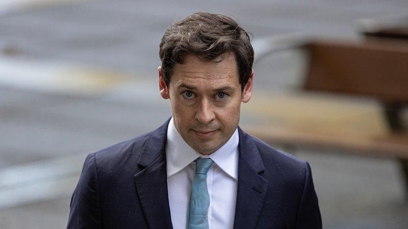 Senior manager at bikie-linked security firm charged over threats to Age journalist