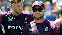 England coach Brendon McCullum speaks to his team in the huddle.