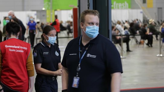 Crowds at the Brisbane Convention and Exhibition Centre on the opening day of the mass vaccination hub, where the Pfizer COVID-19 vaccination is being distributed. 