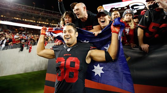 Hayne poses with fans after helping the San Francisco 49ers to victory over Minnesota in the NFL.