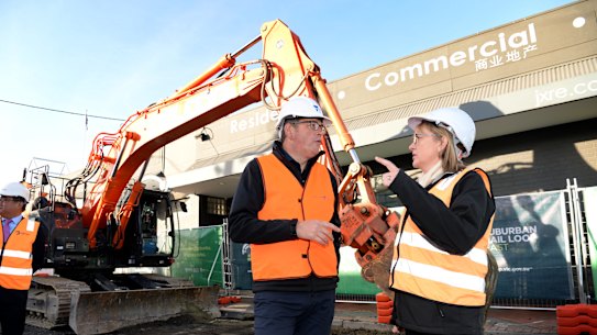 Premier Daniel Andrews and Jacinta Allan, now his deputy, inspect works on the Suburban Rail Loop station in Clayton earlier this year.