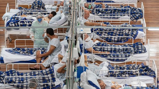 COVID-19 patients are treated in a field hospital built inside a gym in Santo Andre, on the outskirts of Sao Paulo, Brazil.
