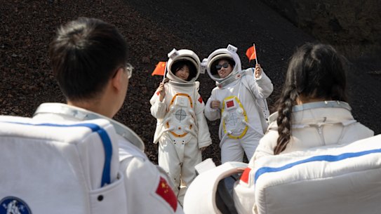 China’s patriotic tourists travel to watch the rocket launch in Hainan. 