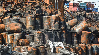 Burnt-out chemical drums after the fire at the West Footscray factory last year.