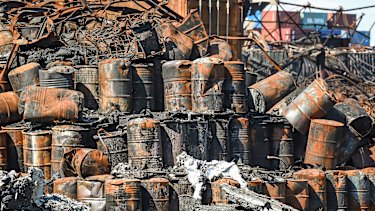 Burnt-out chemical drums after the fire at the West Footscray factory last year.